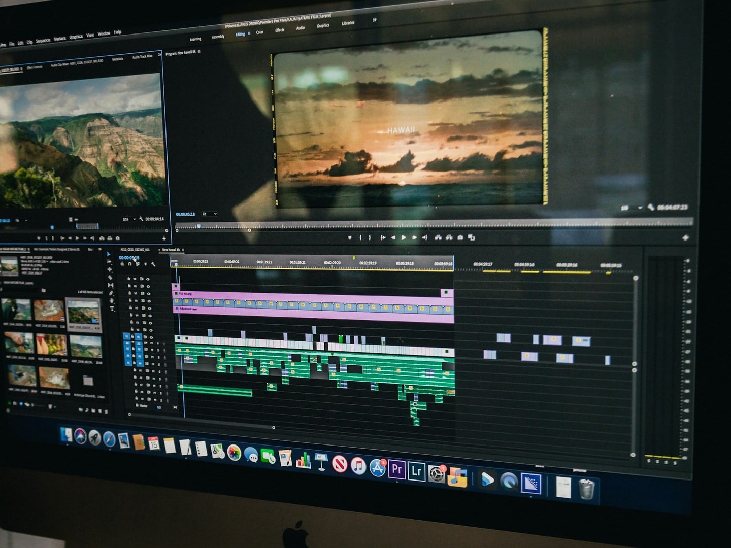 Apple iMac video editing workstation running Premiere Pro timeline